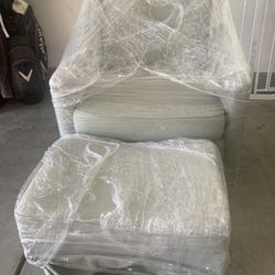 Comfortable Chair and Ottoman.