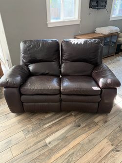 Dark Brown Leather Reclining Loveseat