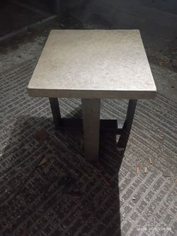 Very sturdy someone heavy modern end table