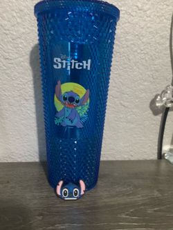 Stitch tumbler new it’s sitting in my cupboard. No straw included lost it.  Also comes with a stitch croc  charm