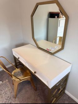 Vanity, mirror, and chair