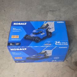Lawn mower - charger & 2 batteries Included