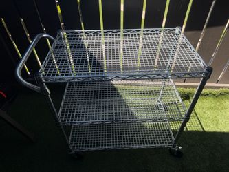 heavy-duty 3-tier chrome wire shelving cart with wheels and a push handle
