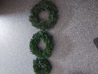 3 wreaths and ceramic bird