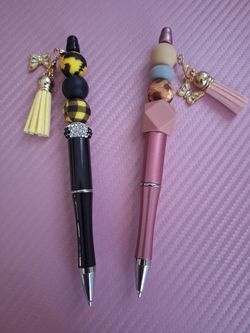 Bolígrafos y llaveros