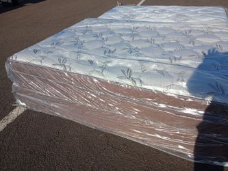 Brand new king size pillowtop mattress and box spring free delivery depends on location