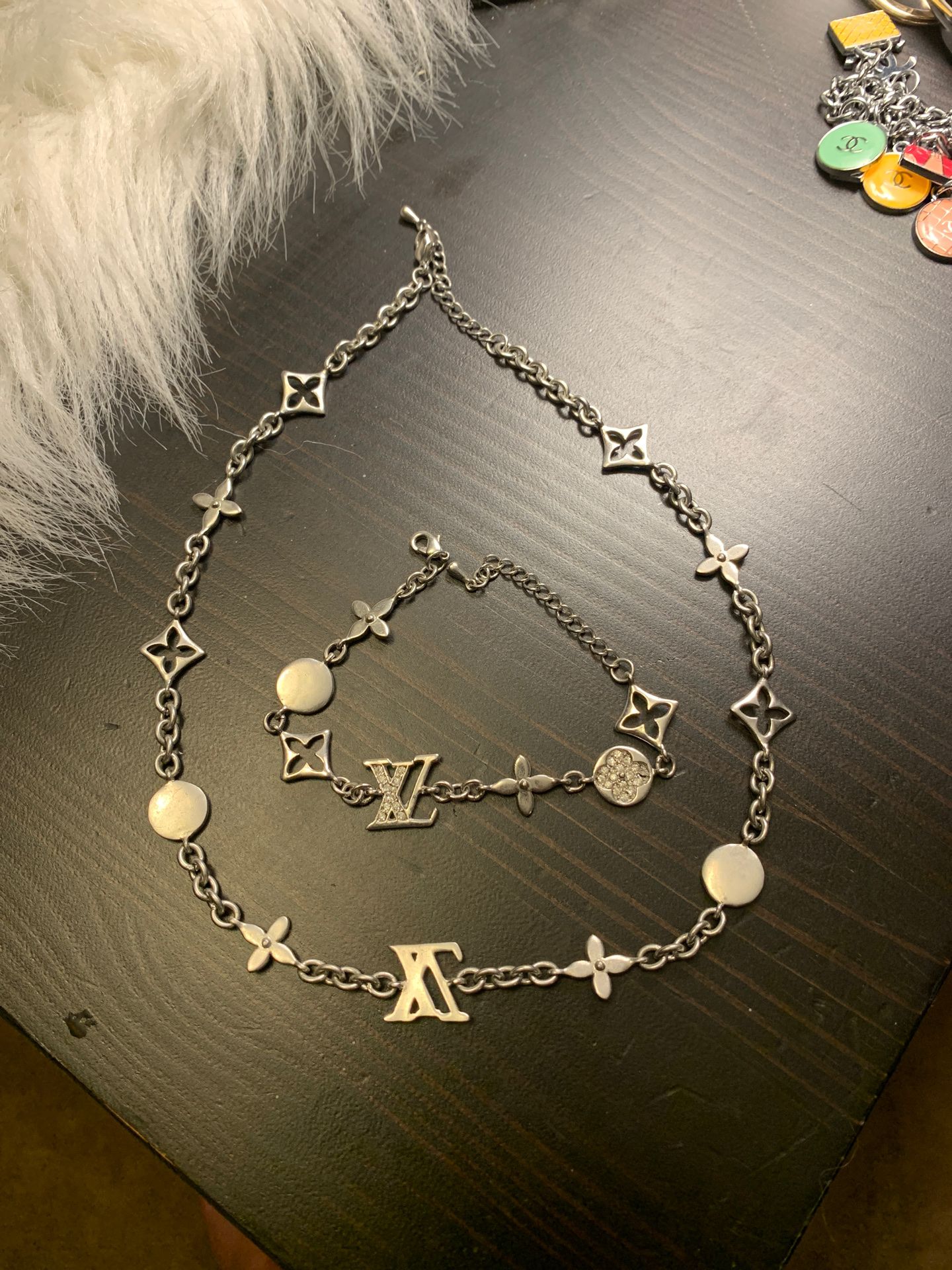 Beautiful silver tone necklace with matching bracelet