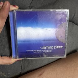 Preowned Calming Piano Unwind With This music cd in good condition located off lake Mead and Simmons area asking $3