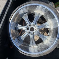Four 25’’ Rims And Tires