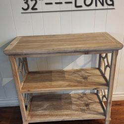 FARMHOUSE CONSOLE ENTRY TABLE. BEAUTIFUL SIDE INSERTS. 2 SHELVES. LIGHT NATURAL WOOD TONES. 17" WIDE x 301/2" TALL x 32" LONG. EXCELLENT CONDITION!