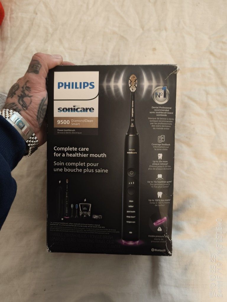 Title: Philips Sonicare 9500 Electric Toothbrush Set (New, No Brush Heads