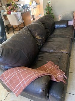 Real leather sofa  7 ft 8in.  Brown 