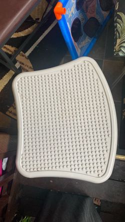 Kids, black and gray table with LEGO  Base Plate
