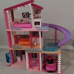 Barbie dream house with car and accessories