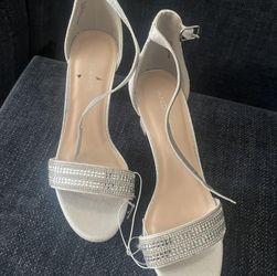 Women's silver heels, size 7.5, new