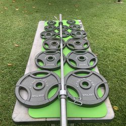 Full Set Of Easy Grip Olympic Weights With 7’ Bar