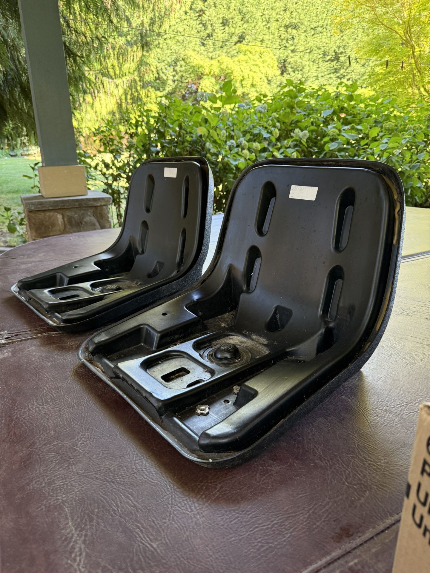 Two hard plastic seats