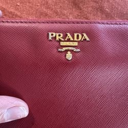 Authentic Red Prada Zippie Leather 