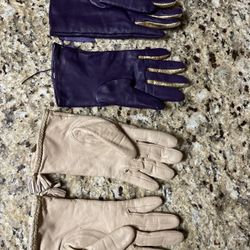 Two pair of medium leather gloves. 