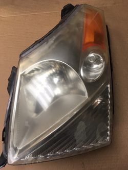 2007 Suzuki XL7 headlight Driver Side