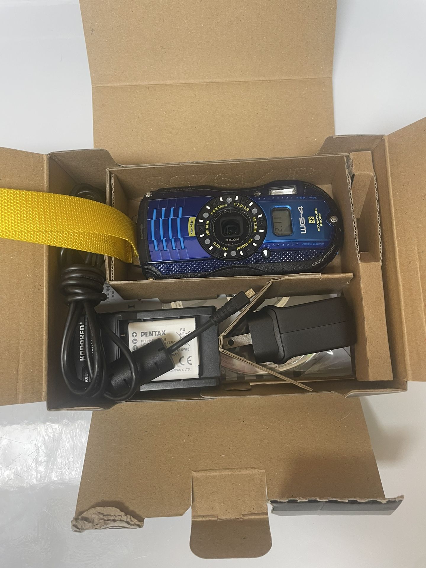 Famous and Unique RICOH WG-4 GPS Underwater Camera with accessories, original box and documentation. Like New!
