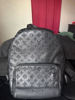 Monogram Leather Backpack