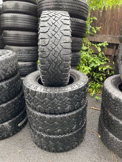 LT295/65R18 Goodyear 285/65/18 LT set of 4 matching used tires in great condition 400$ for 4 tires plus tax. Mount available but not included. Wheel a