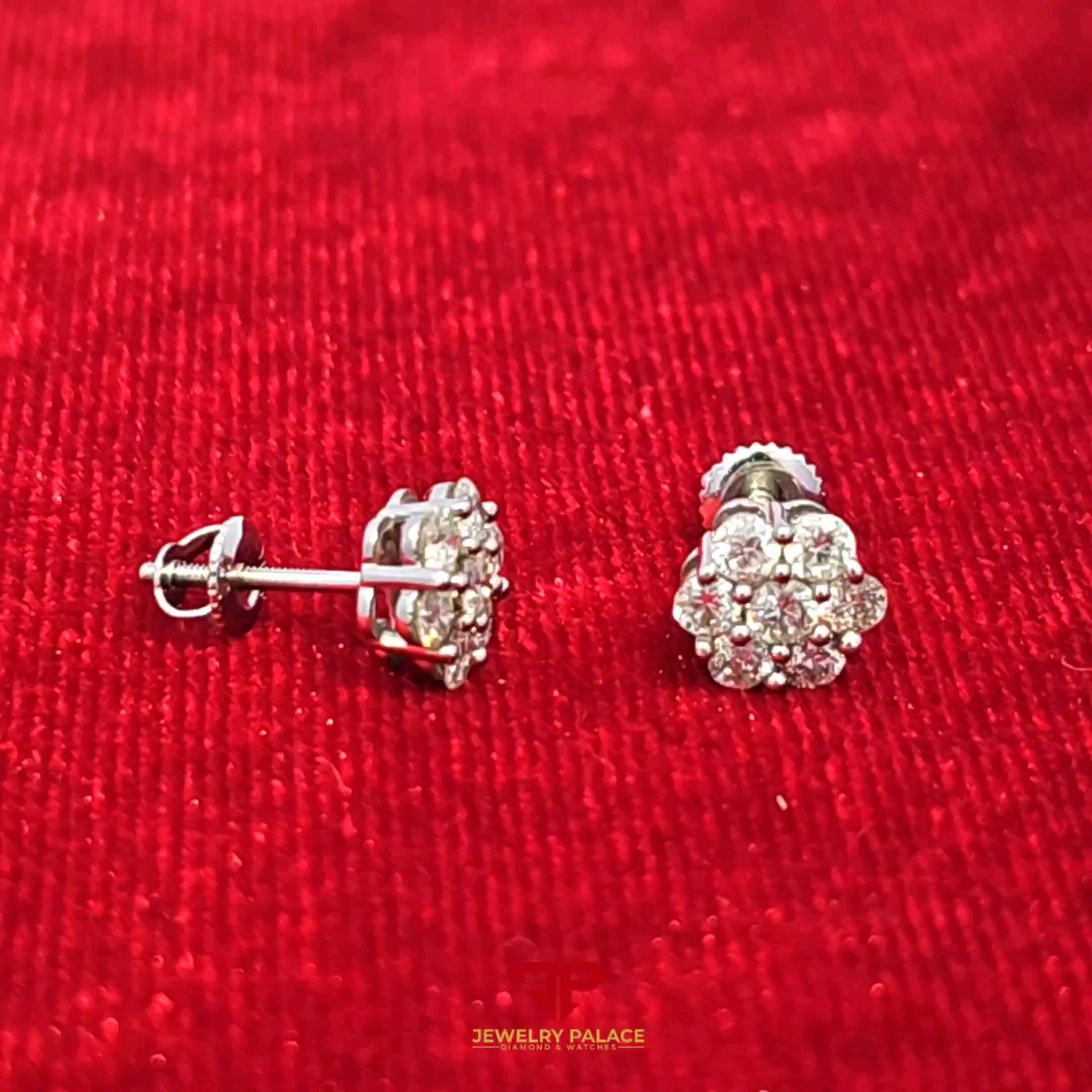 Fancy flower earring with 10K White Gold and 0.875 CTW diamonds