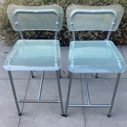 2 modern, glass + metal barstools