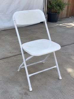 50 White Folding Plastic Chairs — $10