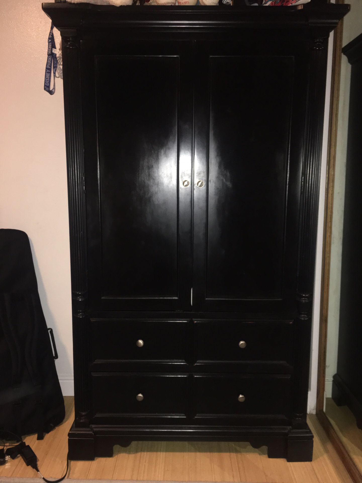 Black dresser and armoire