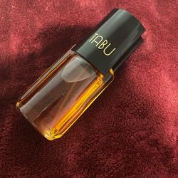 TABU Cologne “Smells Like Church Oil” Next To Gatorade Bottle For Size Comparison
