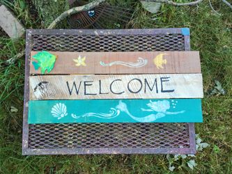 Coastal welcome sign