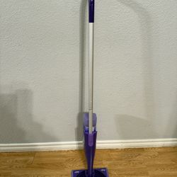 Swifter With Full Bottle Of Solution.