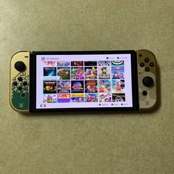 NINTENDO SWITCH OLED MOD with 125 SWITCH GAMES + Over 7000 RETRO GAMES