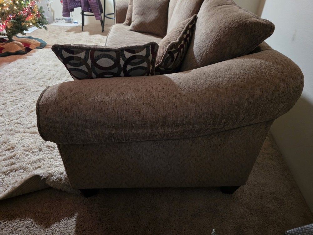 3 Seat Brown Couch With 4 Total Couch Pillows