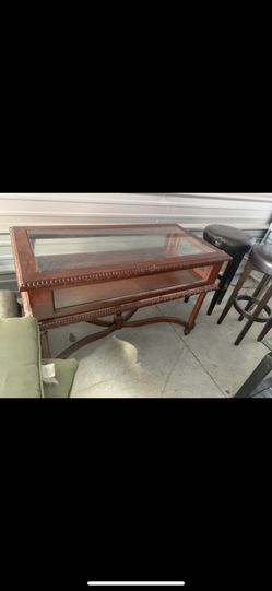 Nice display cabinet opens on side