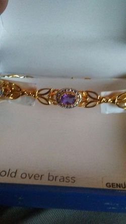 Bracelets. New 18 k over.real stones