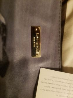 Brand new Kate Spade bag with mathing purse.