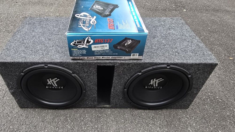 2 12" Subs, Ported Box And 2,000 Watt Amp