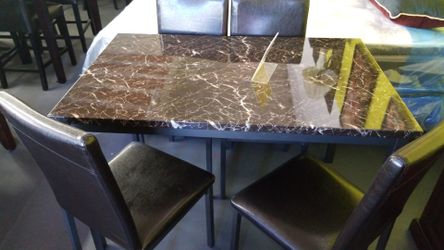 5pc table set 4 chairs and table size 30x48
