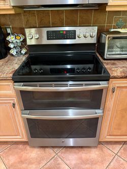 GE OVEN STOVE STAINLESS STEEL USED