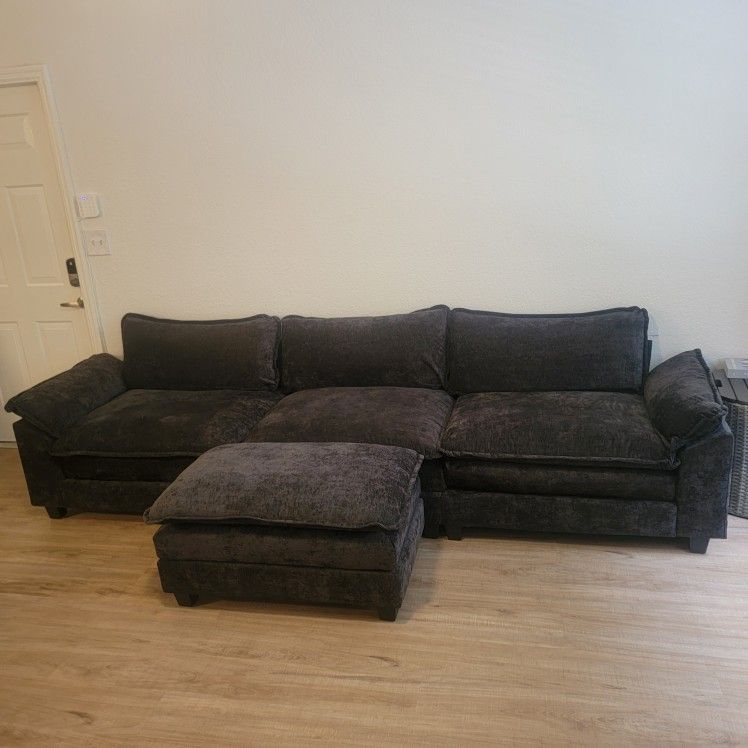 Black Couch with floating ottoman