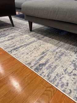 Blue/white marbled area rug 6x8