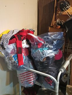 2 bags of clothes size medium and large