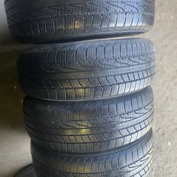 full Set Goodyear P215 -65-16   85/100 % TREAD FREE Q