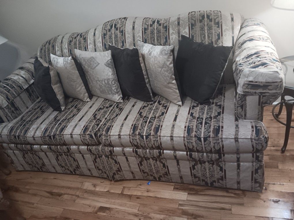 Sofa and armchair with cushions 