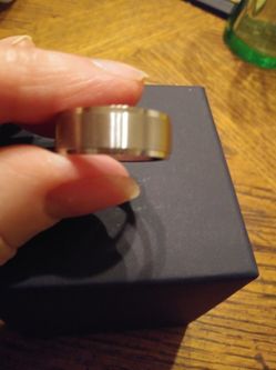 I have a Brand New Silver mens wedding band
