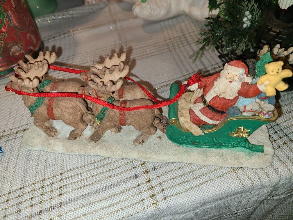 Santa Sleigh & reindeer Resin Sculpture