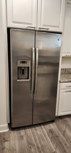 GE profile 21.9 Cu. Ft Side-By-Side fridge refrigerator